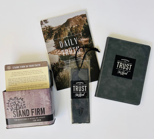 Trust in the Lord gift set items displayed outside box - Daily Truth Scripture book, opened Stand Firm devotional tin showing cards inside, gray Proverbs 3:5 journal, and gray black bookmark - Christian men's faith gift with 150 devotions