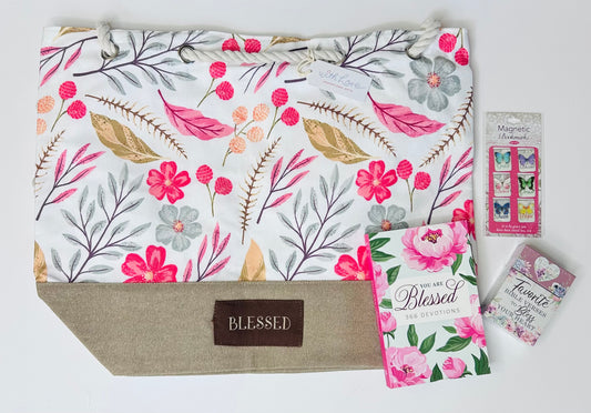Blessed care box contents laid out showing You Are Blessed softcover devotional book, Favorite Bible Verses to Bless Your Heart Box of Blessings cards, Blessed canvas tote bag with rope handles and Butterfly Blessings mini magnetic bookmark set for gratitude and encouragement