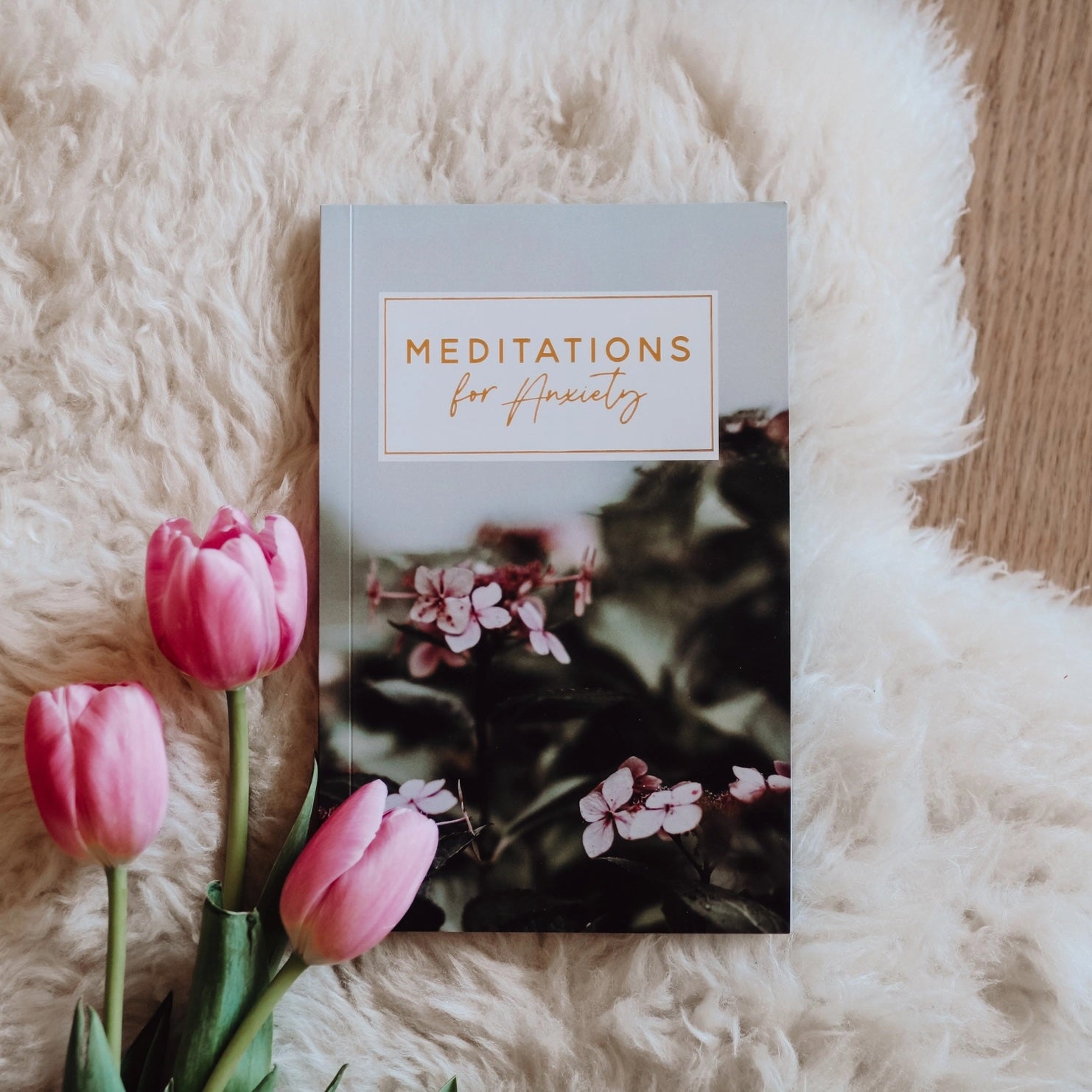 Meditations for Anxiety 31-day booklet with tulips, featuring daily guided meditations for anxiety relief and mindfulness, included in Anxiety & Peace Box