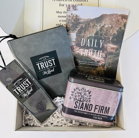 Trust in the Lord Christian gift box for men showing all 4 items inside - Daily Truth topical Scripture book, Stand Firm devotional cards in tin, gray journal with Proverbs 3:5, and gray black bookmark - faith-based encouragement gift