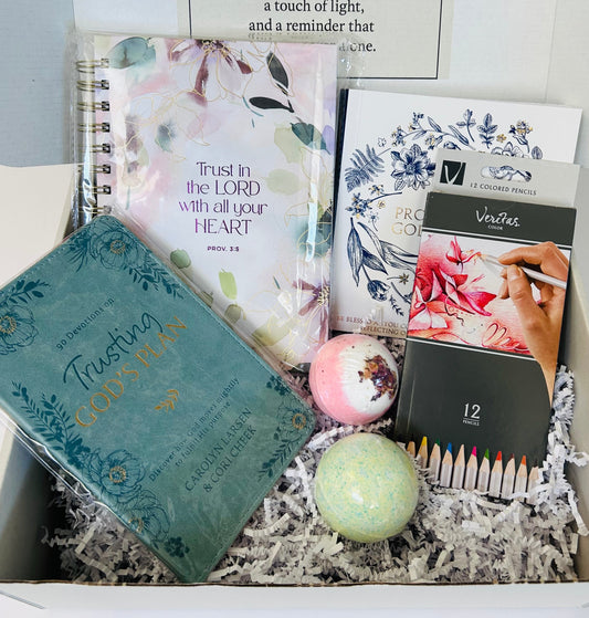 Trust in the Lord anxiety and peace care box with 365 Promises coloring book, Trust in the Lord journal, devotional, colored pencils and bath bombs arranged in Soul Haven gift box