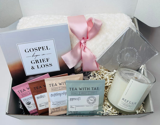 Gift box with tea bags, a candle, and a card titled 'Gospel Hope in Grief & Loss' on a white background.