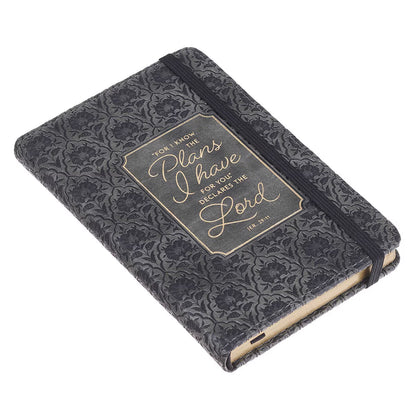 Front cover of I Know the Plans Graphite Gray Faux Leather Hardcover Notebook with Elastic Closure Jeremiah 29:11 laying flat on white background included in Teen Boy Blessing Box