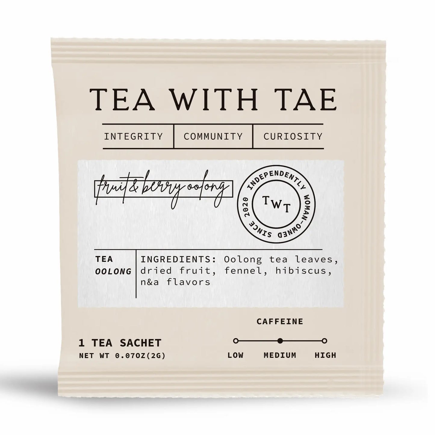 Tea package with 'Tea with Tae' branding and tea ingredients information on a white background inside a vanilla colored sachet.