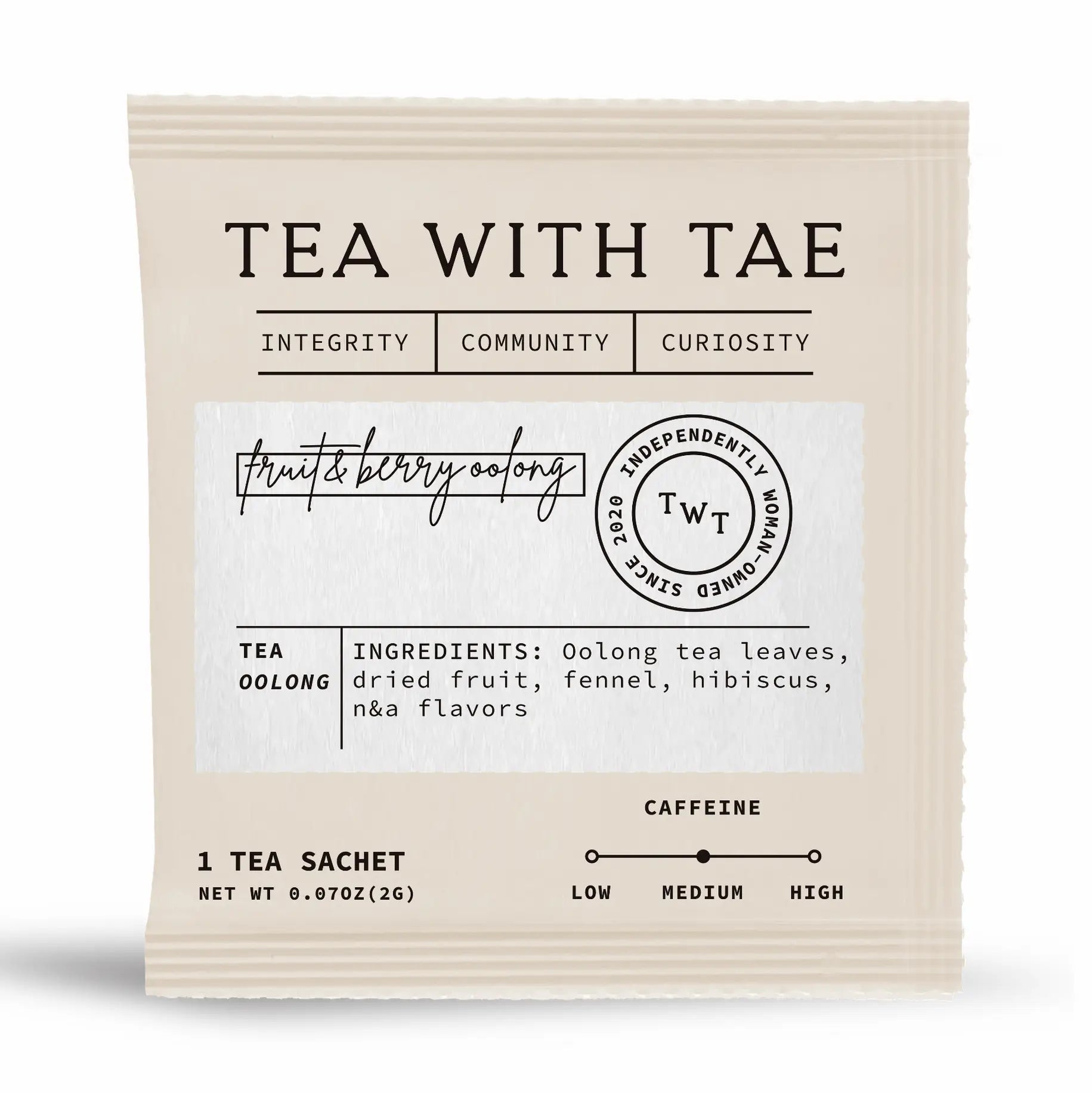 Tea package with 'Tea with Tae' branding and tea ingredients information on a white background inside a vanilla colored sachet.